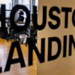 Door with the Houston Landing logo on it.